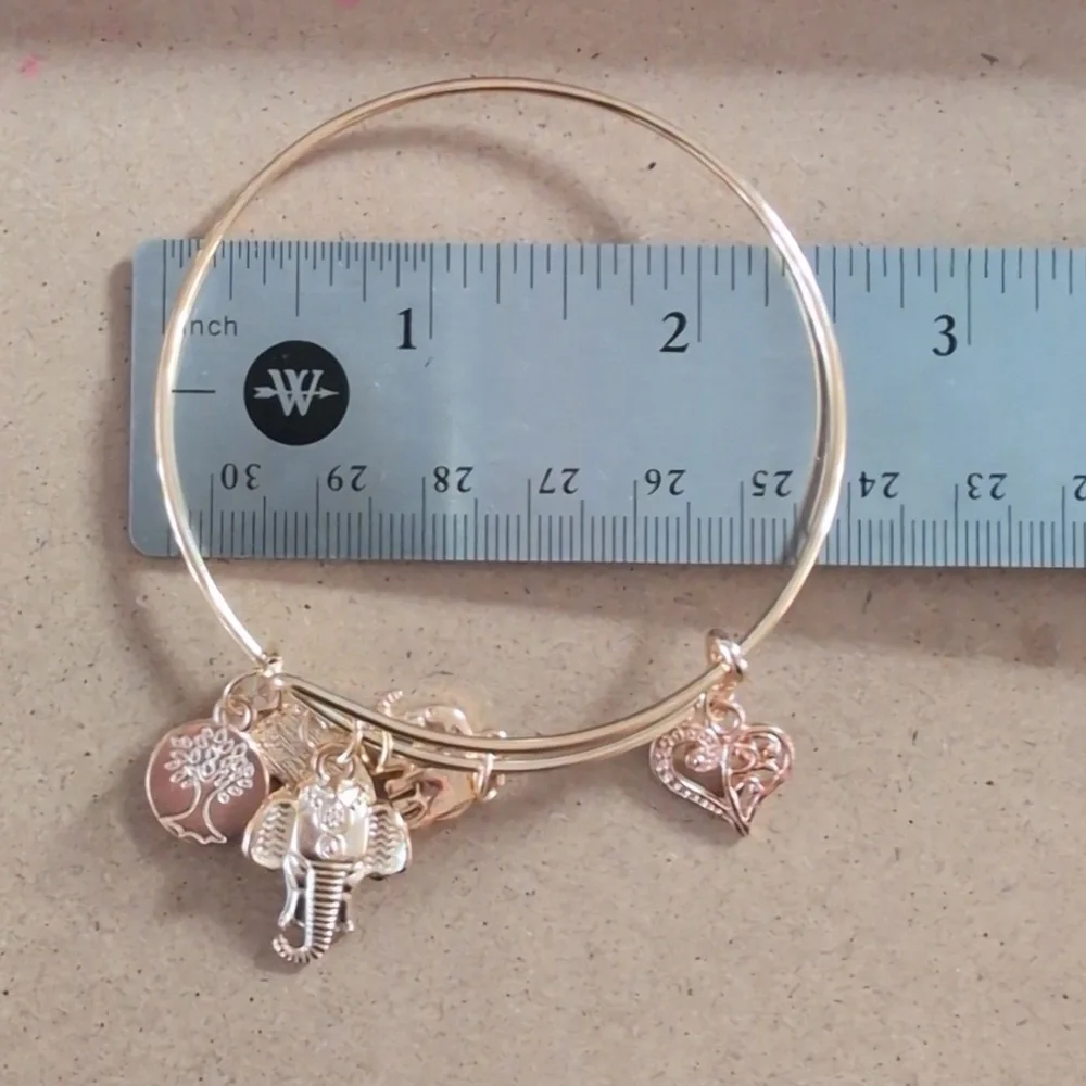 Gold Charm Bracelet with Elephant and Heart Accents